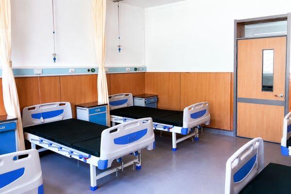 What health care functions does the multi-functional medical bed have?